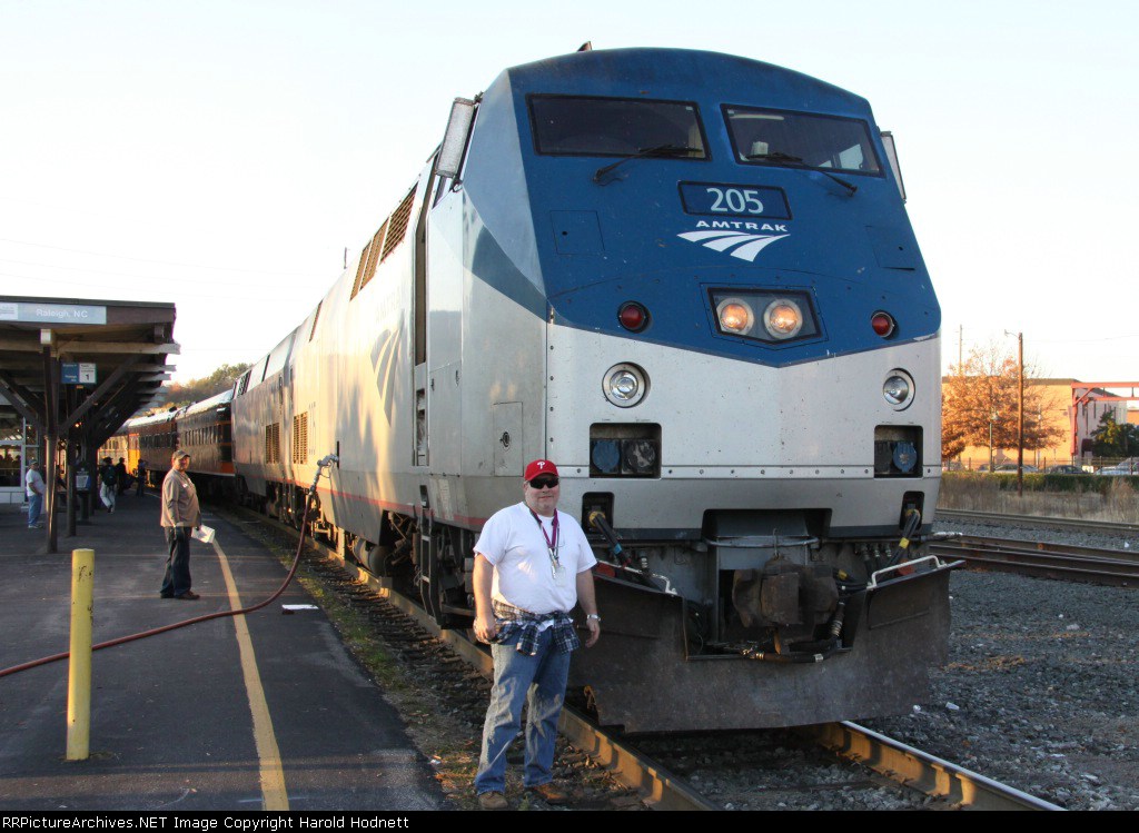 AMTK 205 on train 956 poses with engineer JD Thomas who brought the train into Raleigh